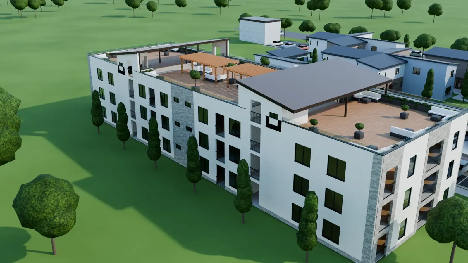 Building 18 from the northwest: three stories, roof decks on all three blocks, two shed roofs over the stairs and two pergolas