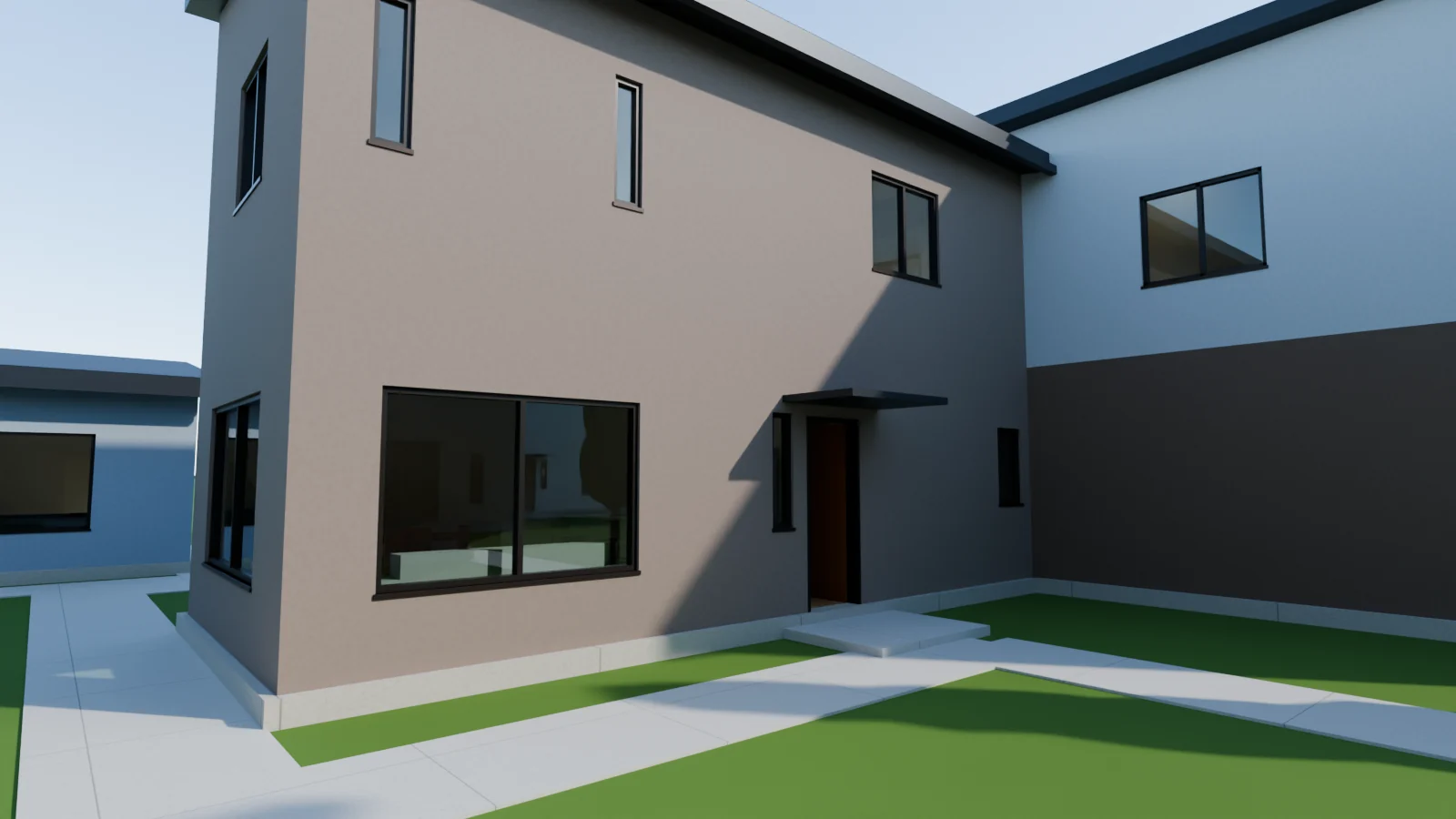 A courtyard between the homes, with a walk leading to a Cottage front door